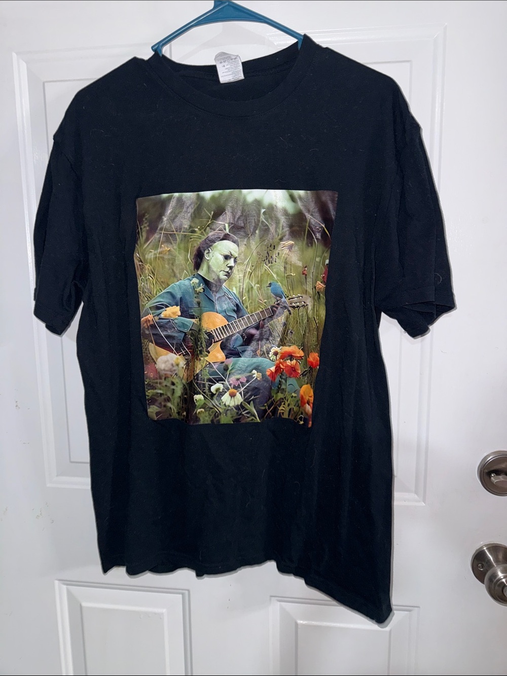 Black Graphic Tee with Colorful Michael Myers Player Print